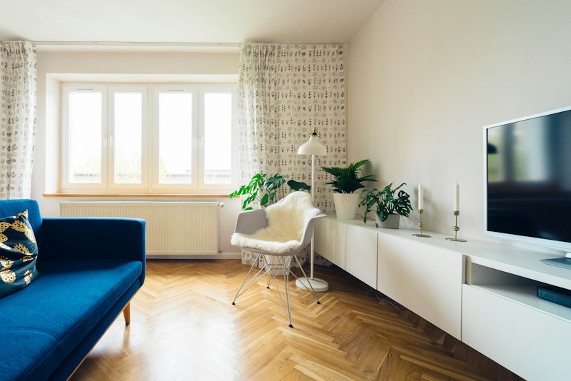 Tiny living room with high ceiling